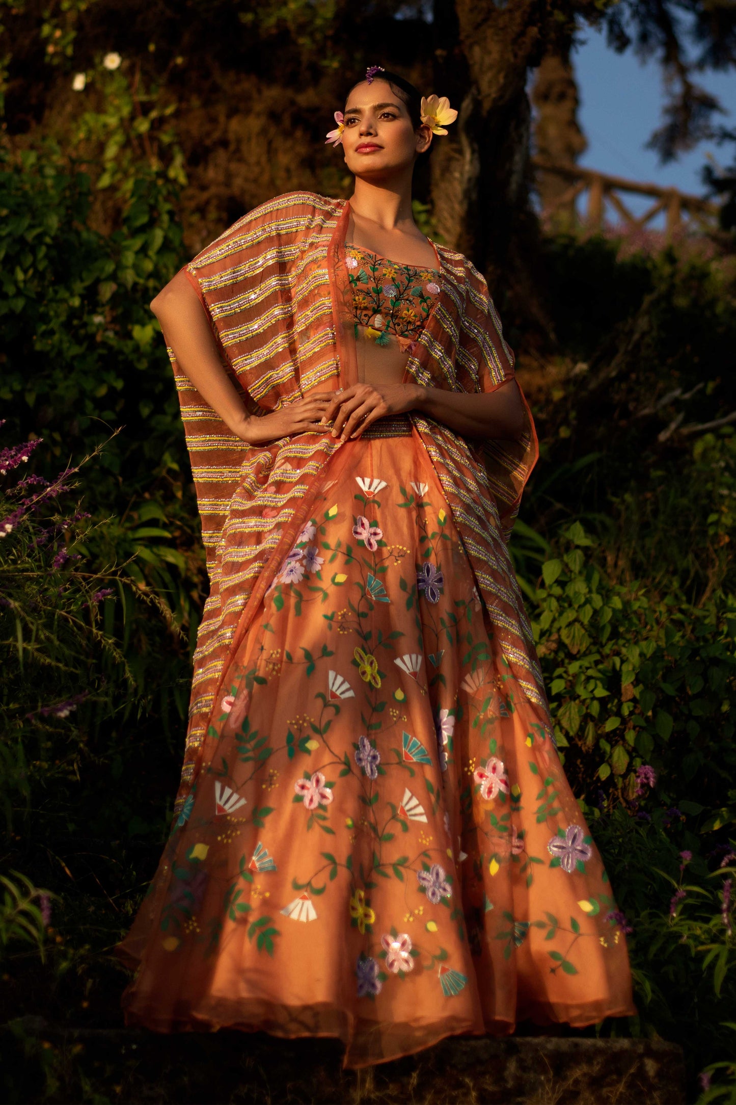 Baavli luxury designer store at Khan Market, New Delhi. Indian wedding, lehenge, Bride, Indian bride, bridesmaid. Orange skirt set with cape. Hand painted and embroidered.