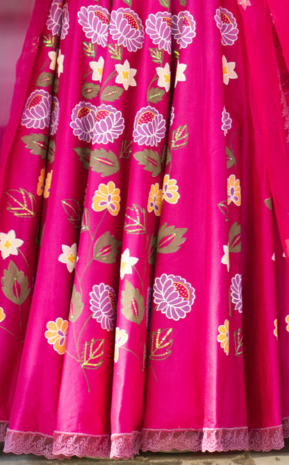 Pink fabric with floral patterns on a plain background

Woman in a bright pink traditional outfit with floral patterns standing in front of a blue door.

Baavli luxury designer store, New Delhi.
Indian wedding, lehenge, Bride, Indian bride, bridesmaid, Suit sets, Kaftan, sharara, jacket, kurta.
baavli launching its new collection,  Hand painted, hand embroidered, Designer Label
