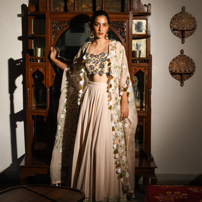 Woman in a traditional outfit standing in front of an ornate wooden mirror.

Baavli luxury designer store, New Delhi.
Indian wedding, lehenge, Bride, Indian bride, bridesmaid, Suit sets, Kaftan, sharara, jacket, kurta.
baavli launching its new collection, Hand painted, hand embroidered, Designer Label