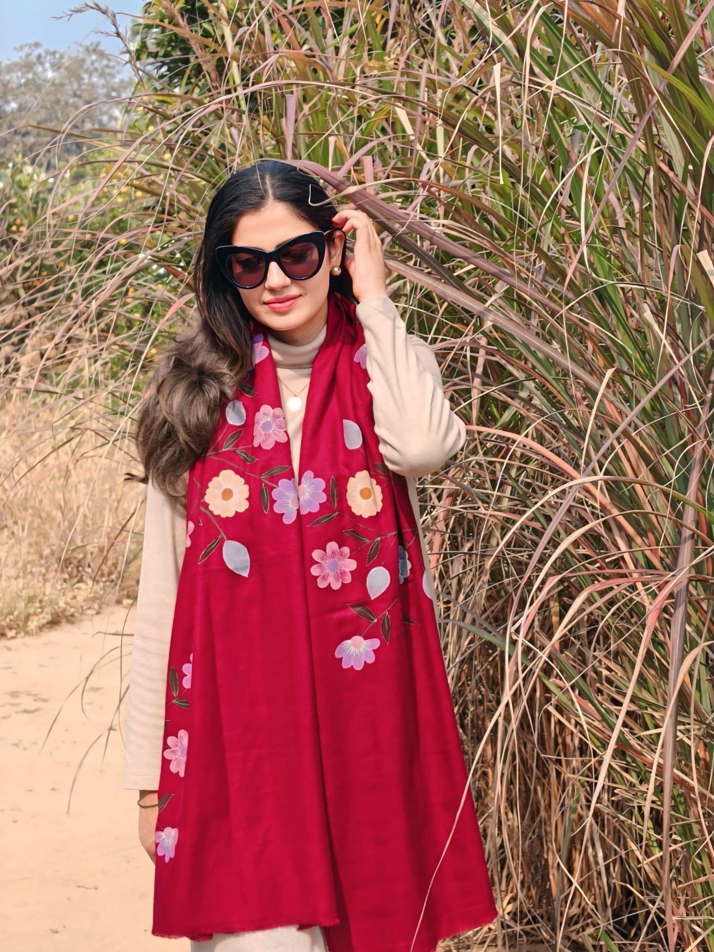 Woman wearing a red floral scarf outdoors

Baavli luxury designer store, New Delhi.
Indian wedding, lehenge, Bride, Indian bride, bridesmaid, Suit sets, Kaftan, sharara, jacket, kurta.
baavli launching its new collection, Hand painted, hand embroidered, Designer Label
Pashmina winter cold snow.
